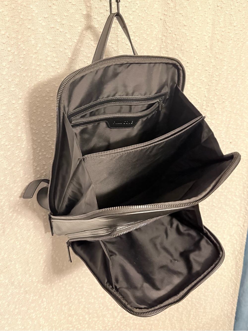 Minimalist Black Vegan Leather Backpack with Front Pocket - Picture 6 of 9